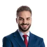 confident-man-wearing-blue-suit-260nw-2742078665